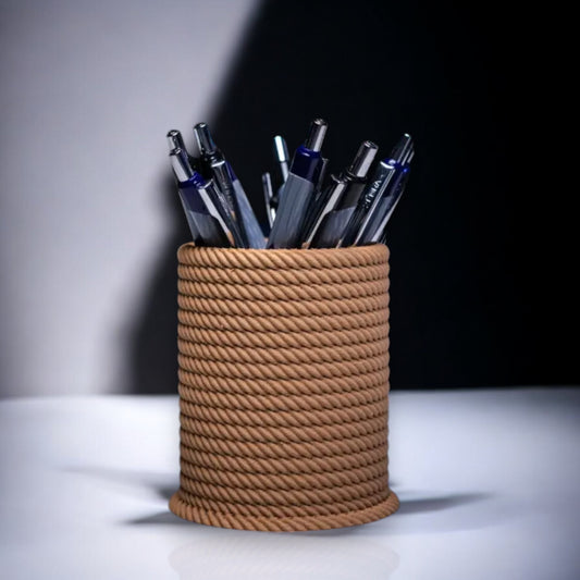 A rope-inspired pen, pencil, or brush holder designed with intricate details to mimic the texture and flow of real rope. Perfect for adding a touch of charm and functionality to any desk or vanity setup.