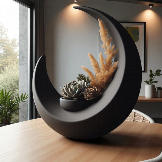 An elegant moon-inspired centerpiece with a celestial design, perfect for adding a touch of sophistication and romance to any space. This stunning decor piece captures the serene beauty of the moon, making it an ideal statement for tables, shelves, or special occasions.
