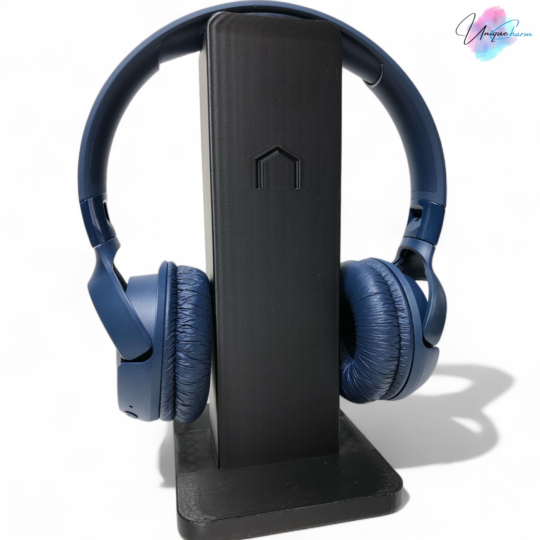 Sleek rectangular headphone stand with a modern minimalist design, featuring a small notch for hanging headphones—ideal for desk organization, gaming setups, or home offices.