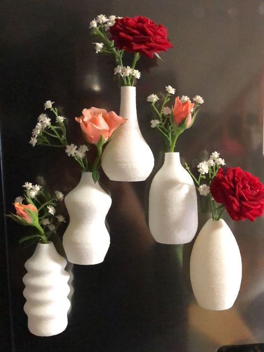 Set of 5 colorful mini magnetic vases on a fridge, each holding small wildflowers, perfect for fridge decor, tiny flower holder, or gift for mom.