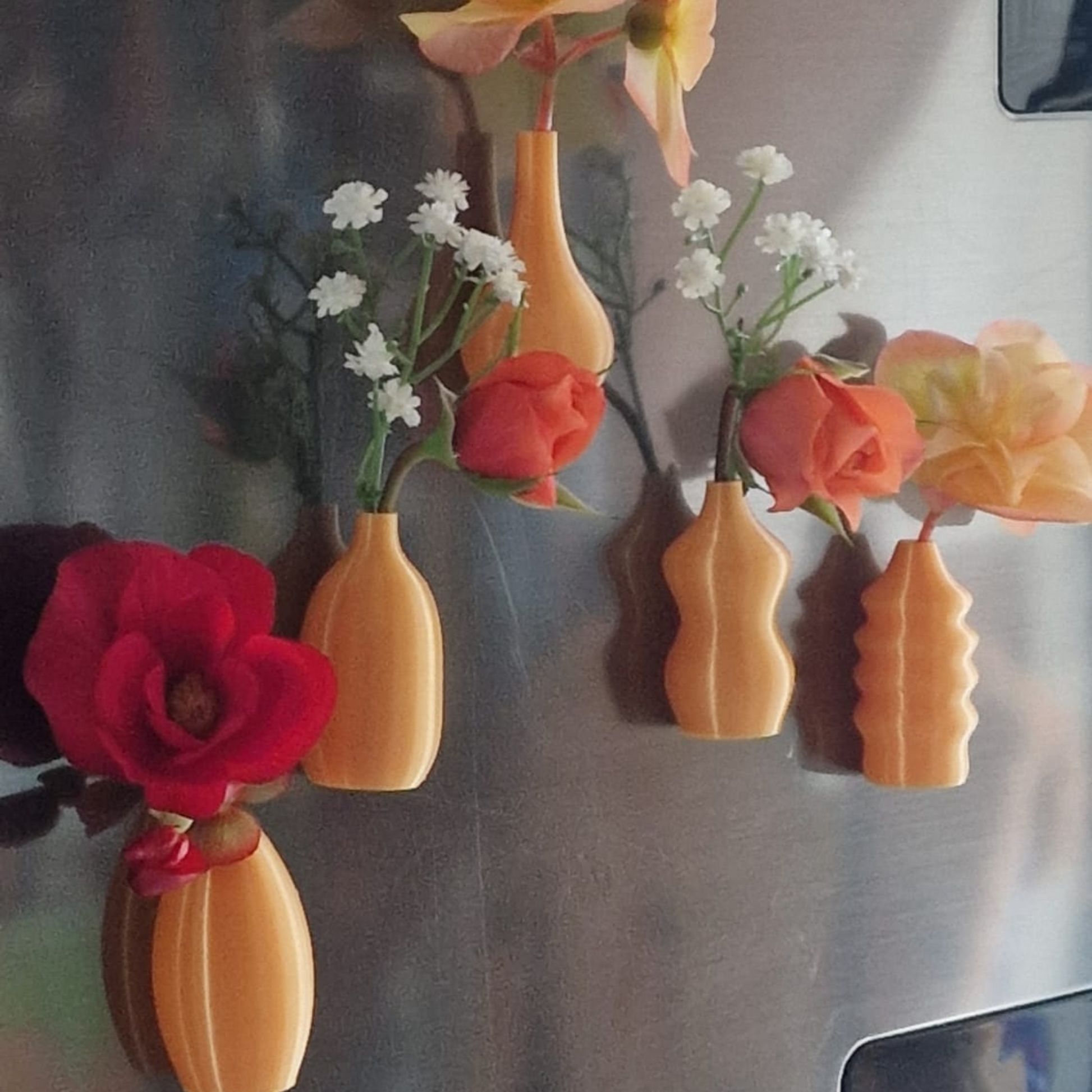 Set of 5 orange mini magnetic vases with flowers on a fridge – Halloween décor