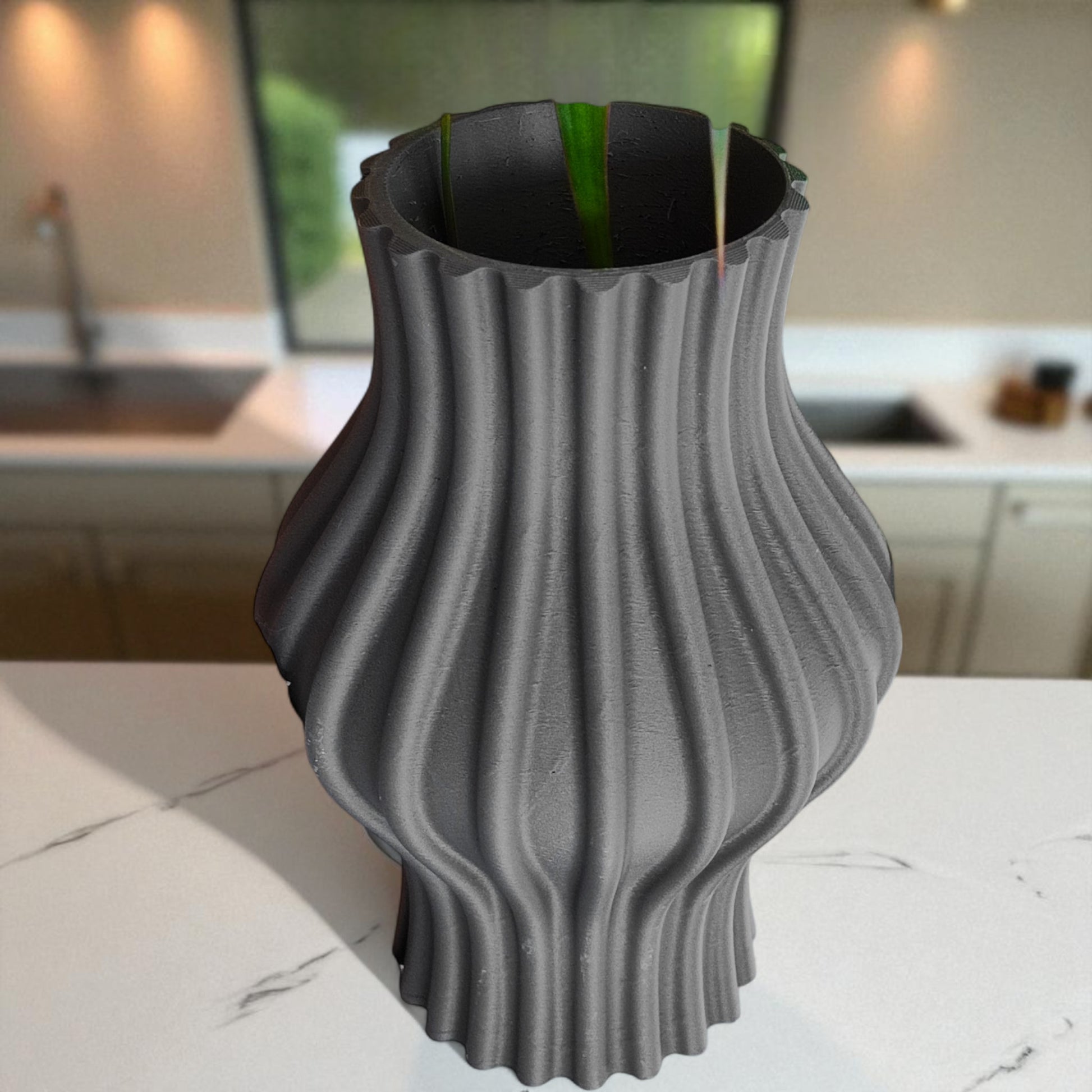 Modern 3D printed sculptural vase with wavy vertical grooves, shown in matte beige color on a white background – minimalist Nordic home decor centerpiece.