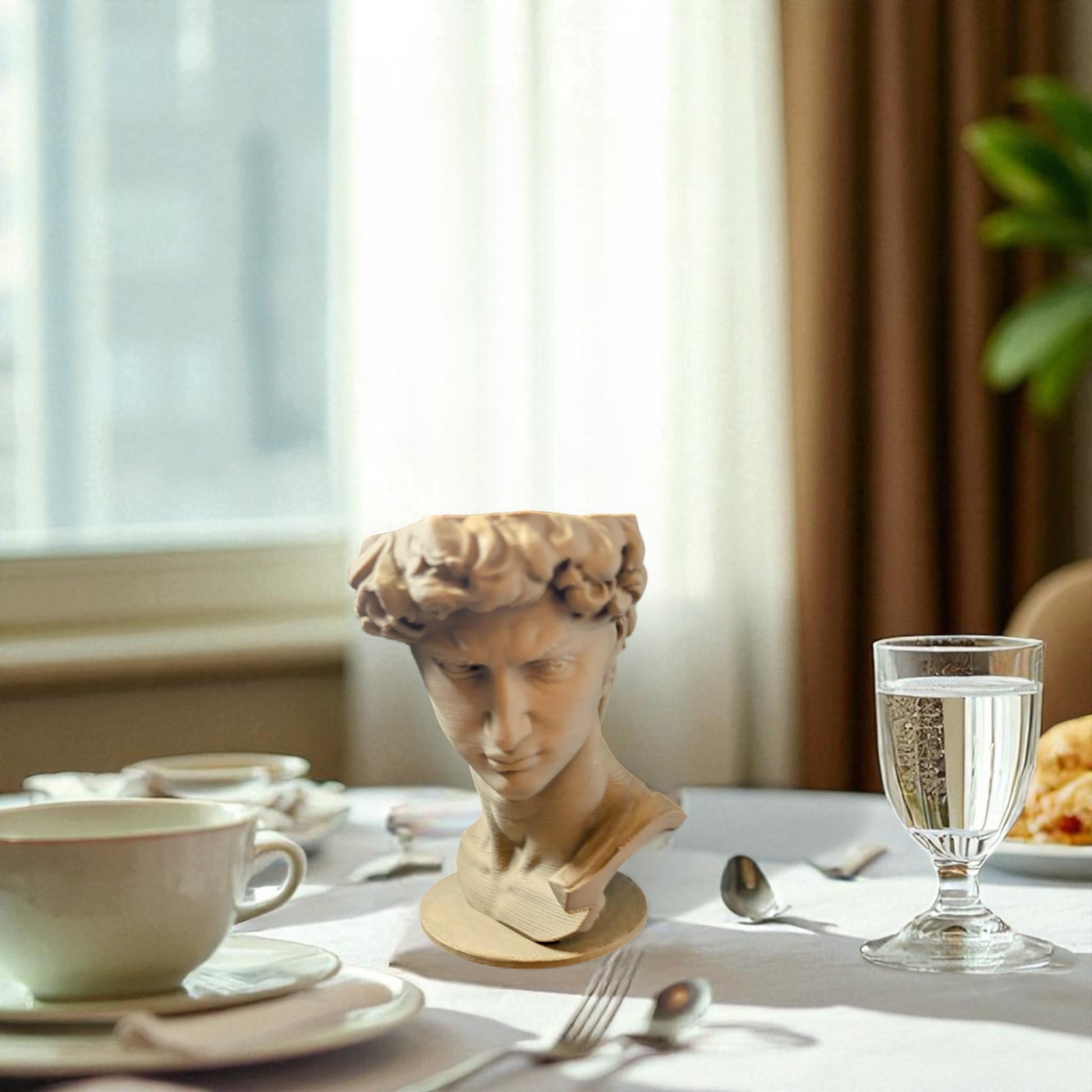 3D printed male bust egg cup in classical sculpture style, featuring a hollowed head holding a boiled egg. Unique breakfast decor piece in white PLA, perfect for Easter table settings or artistic kitchen gifts.