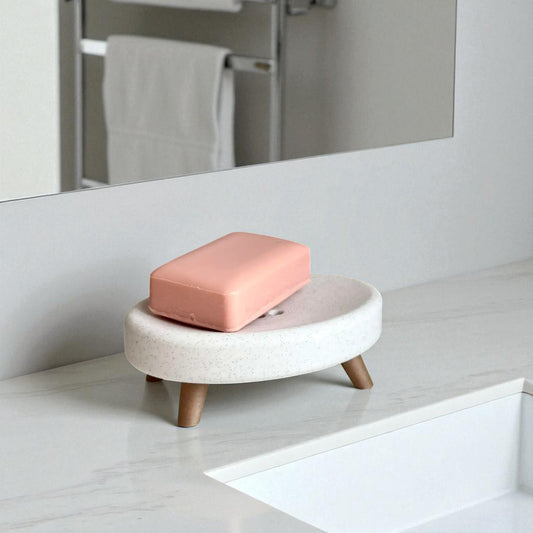 Soap holder with feet and drainage holes, made from durable eco-friendly material, featuring an elevated design to keep soap dry and fresh, perfect for bathrooms, kitchens, or laundry rooms.