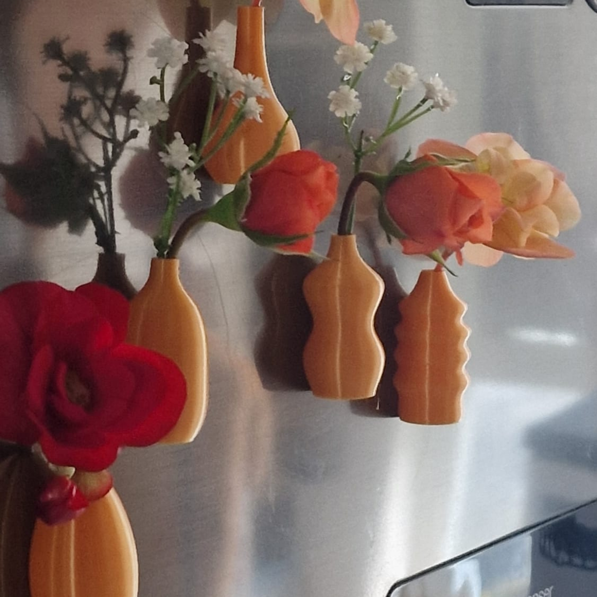 Set of 5 orange mini magnetic vases with flowers on a fridge – Halloween décor