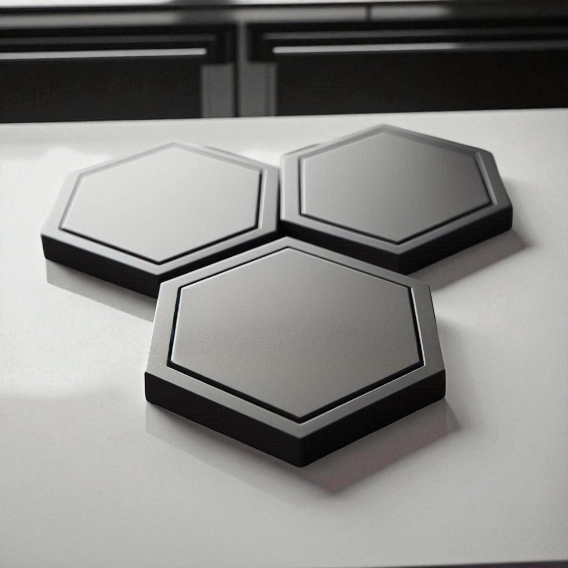 Modern hexagonal coaster in a minimalist design, measuring 115mm x 14mm, perfect for protecting surfaces from hot drinks. Available as a single piece, set of 4, or set of 6. Durable and stylish home decor accessory