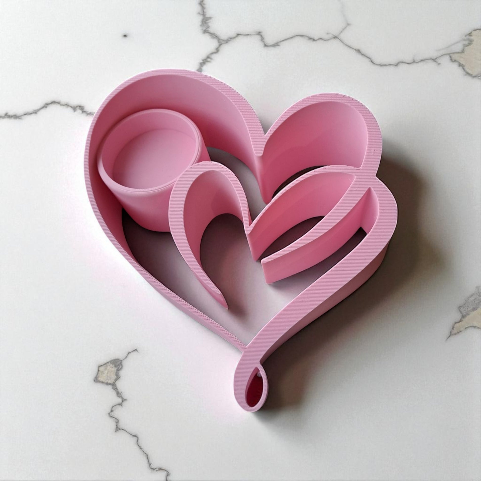 Heart Candle Holder with a romantic double heart design, perfect for tealight candles and creating a warm, elegant ambiance for home decor or special occasions.