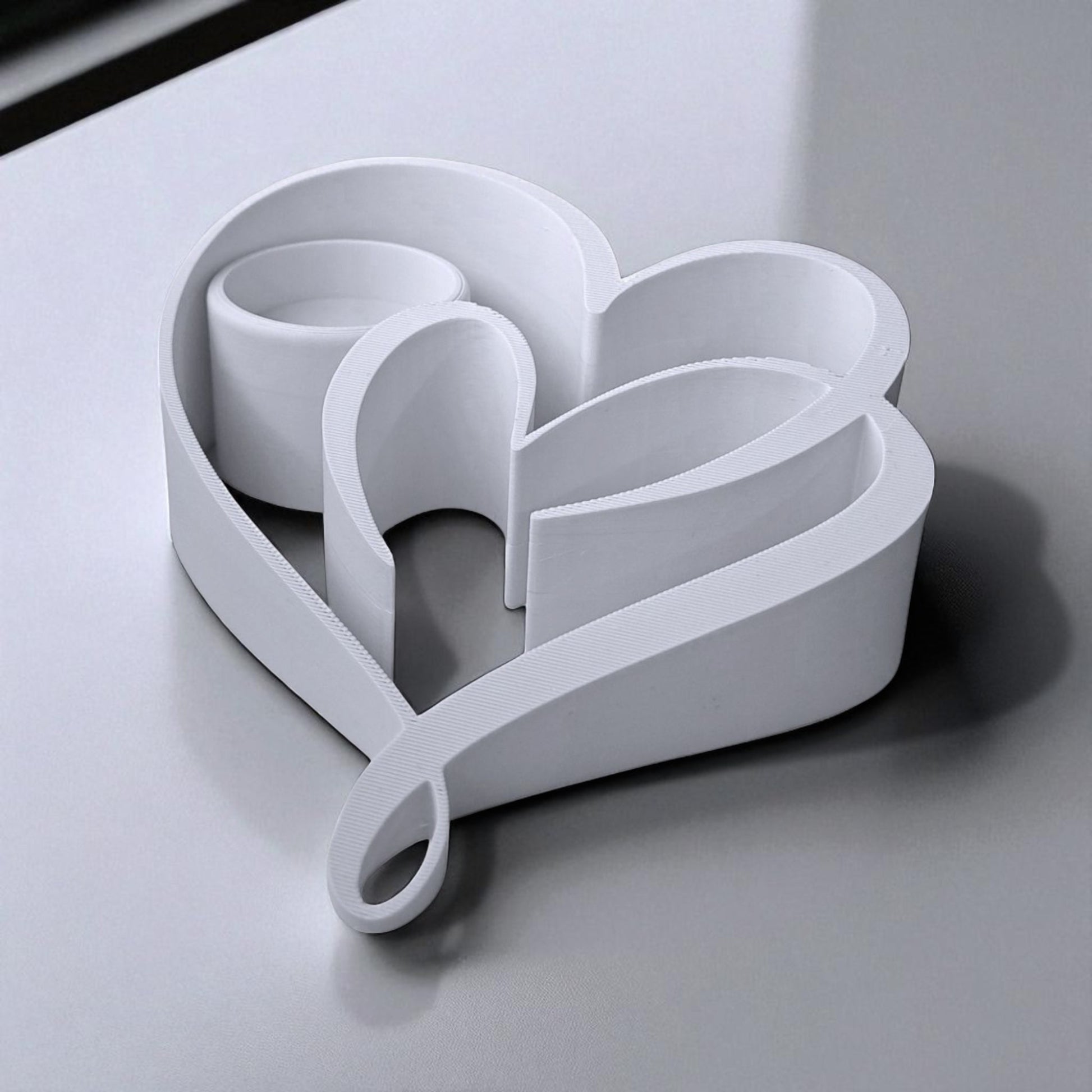 Heart Candle Holder with a romantic double heart design, perfect for tealight candles and creating a warm, elegant ambiance for home decor or special occasions.