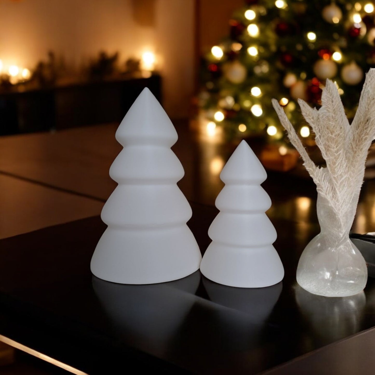 mini and large christmas trees in festive holiday design, perfect for tabletops, mantels, or desks. available individually or as a set, these decorative trees add charm to any holiday décor.