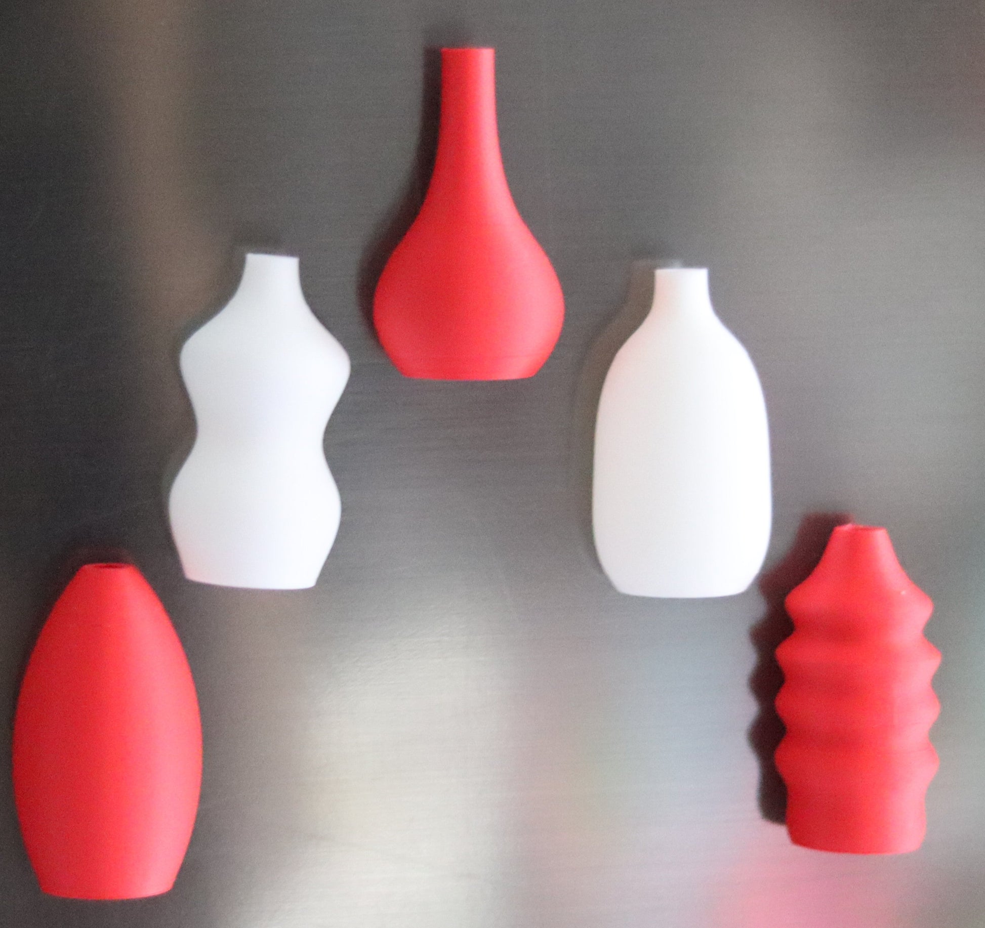 Set of 5 red and white magnetic mini Christmas vases displayed on a fridge – modern holiday home décor