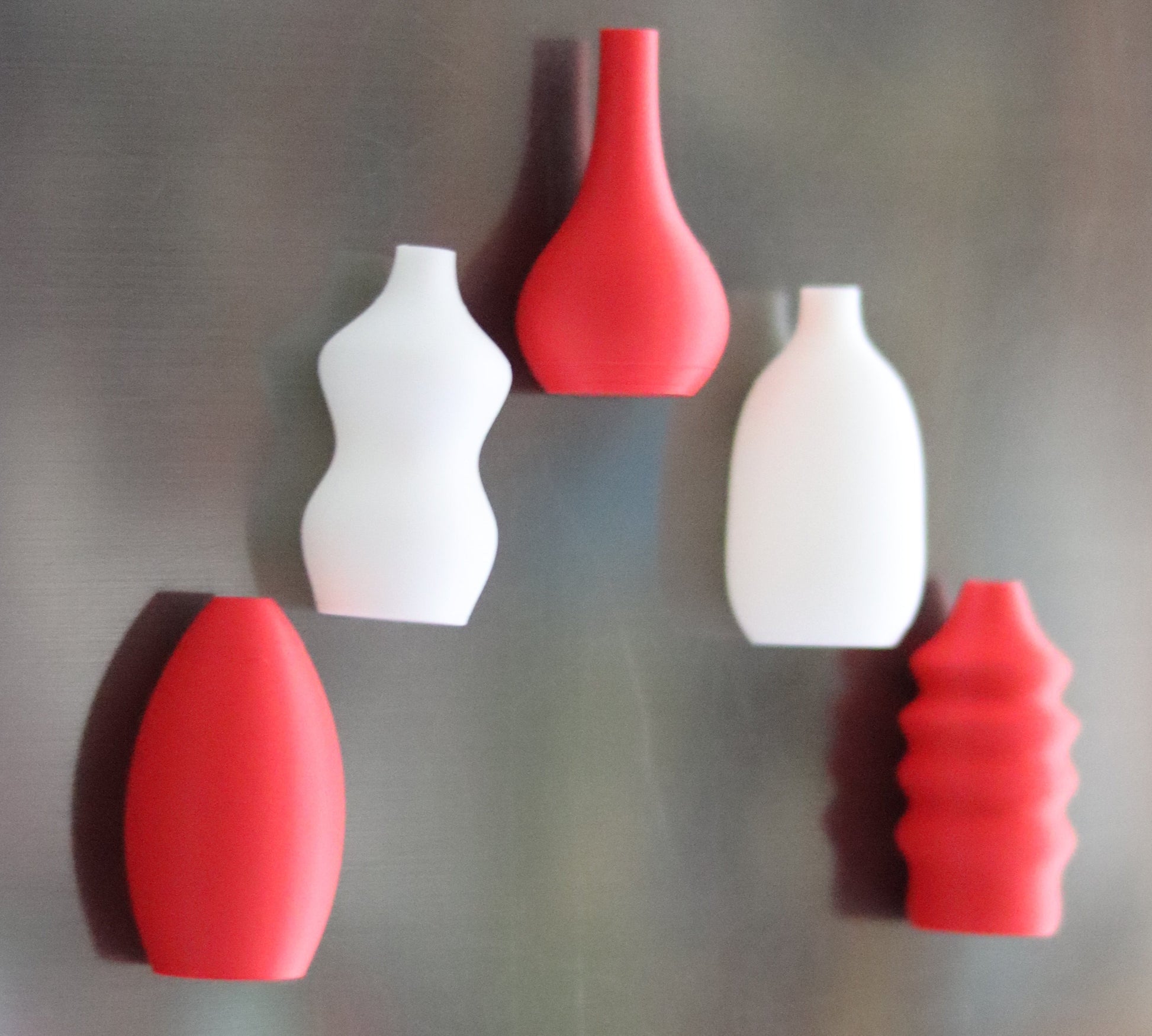 Set of 5 red and white magnetic mini Christmas vases displayed on a fridge – modern holiday home décor