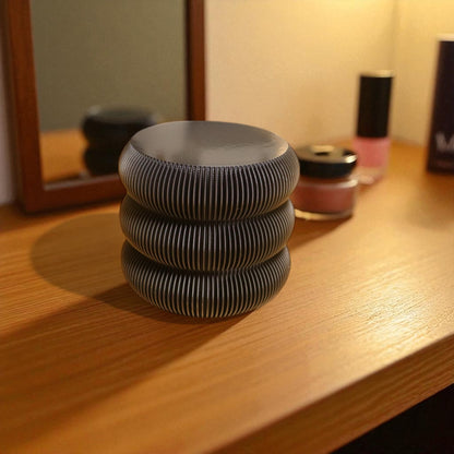 Set of elegant vanity jars in three different sizes, perfect for organizing cosmetics or accessories; available for purchase individually or as a complete set to enhance any bathroom or dressing table decor.
