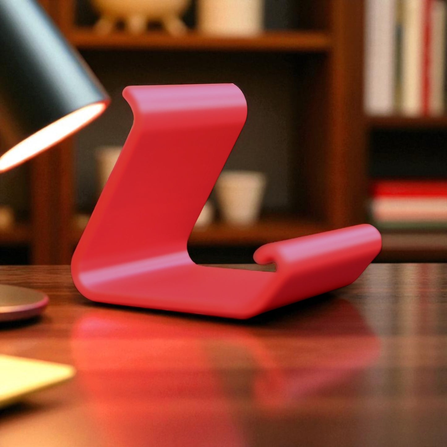 ergonomic phone holder made of durable 3d-printed material, designed with a sleek and modern look. it securely holds your phone at an optimal angle for comfortable viewing, making it perfect for desks, nightstands, or kitchen counters. compact, stylish, and practical for everyday use