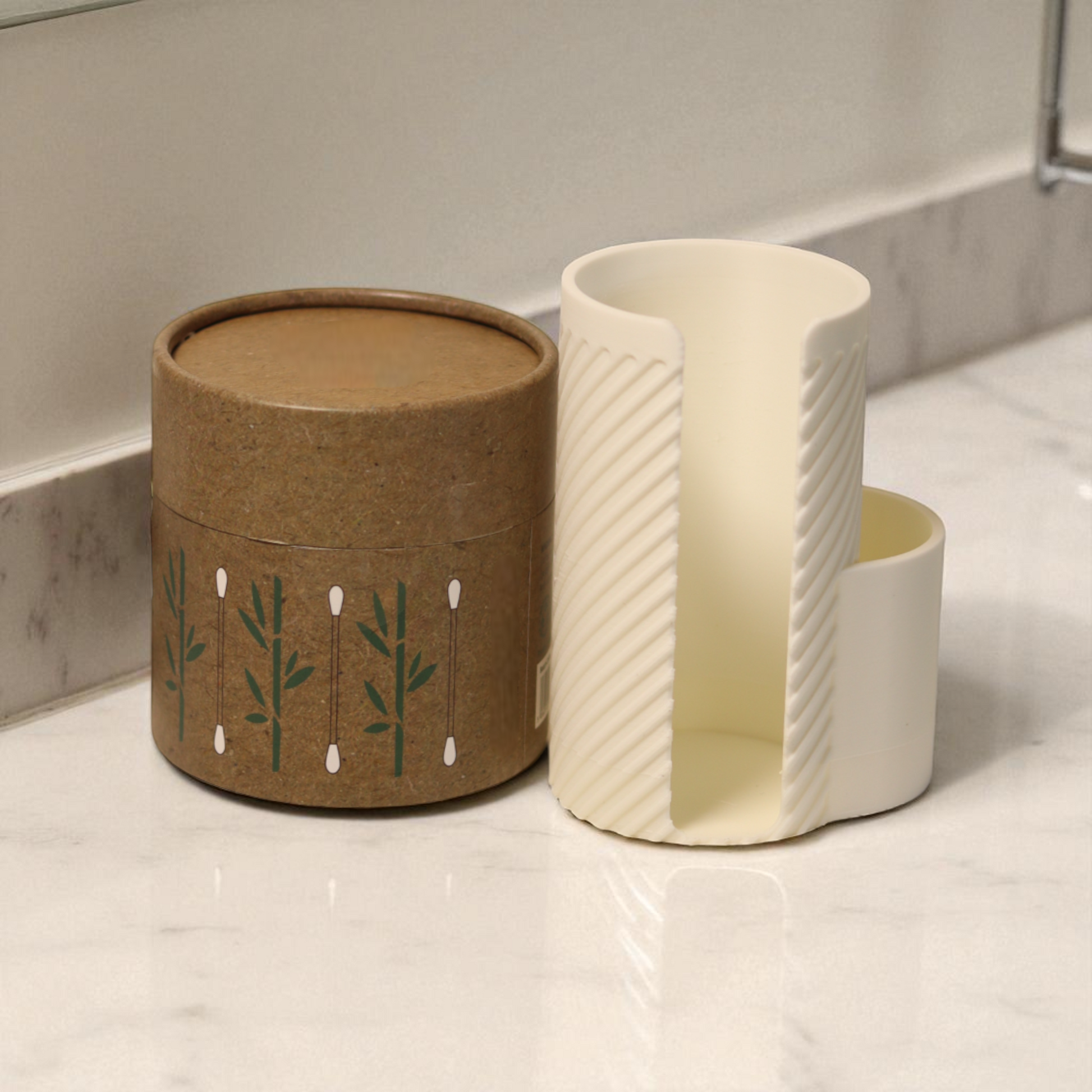 White makeup cotton pad holder with side cup for cotton buds on a vanity; minimal bathroom organizer for cotton rounds and Q-tips.