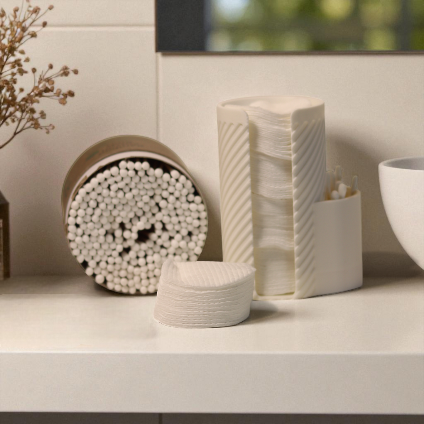 white makeup cotton pad holder with side cup for cotton buds on a vanity; minimal bathroom organizer for cotton rounds and q-tips.