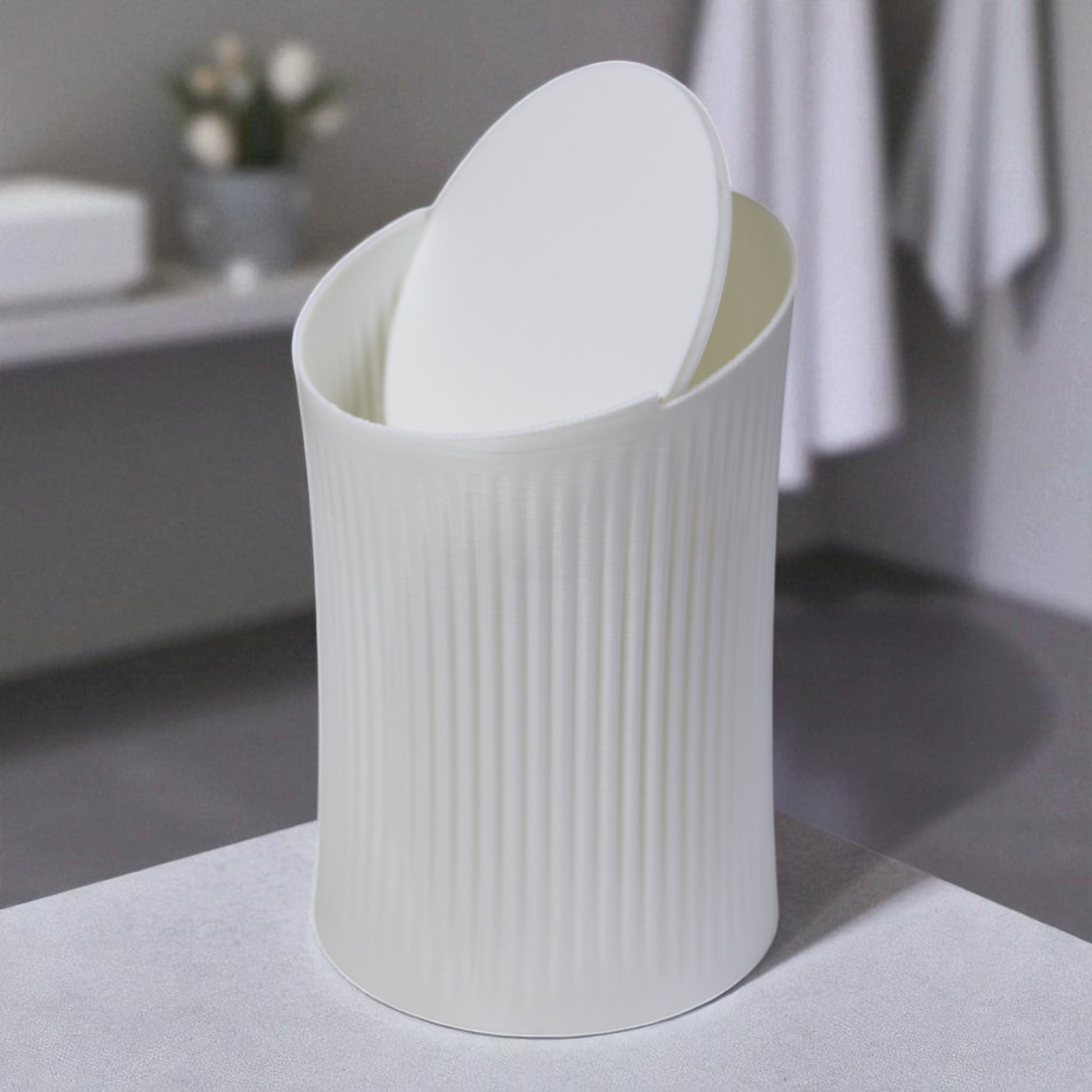 Small trash can for cotton pads, tissues, and desk clutter, minimalist design