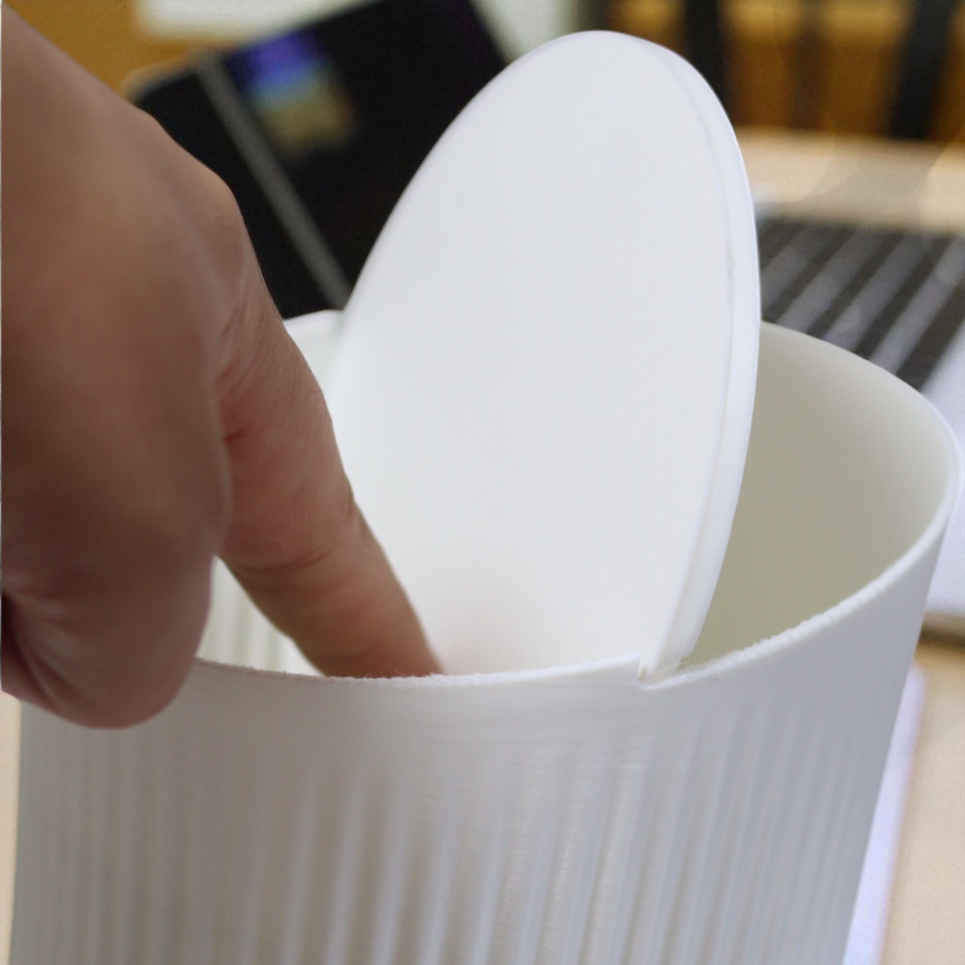 Small trash can for cotton pads, tissues, and desk clutter, minimalist design
