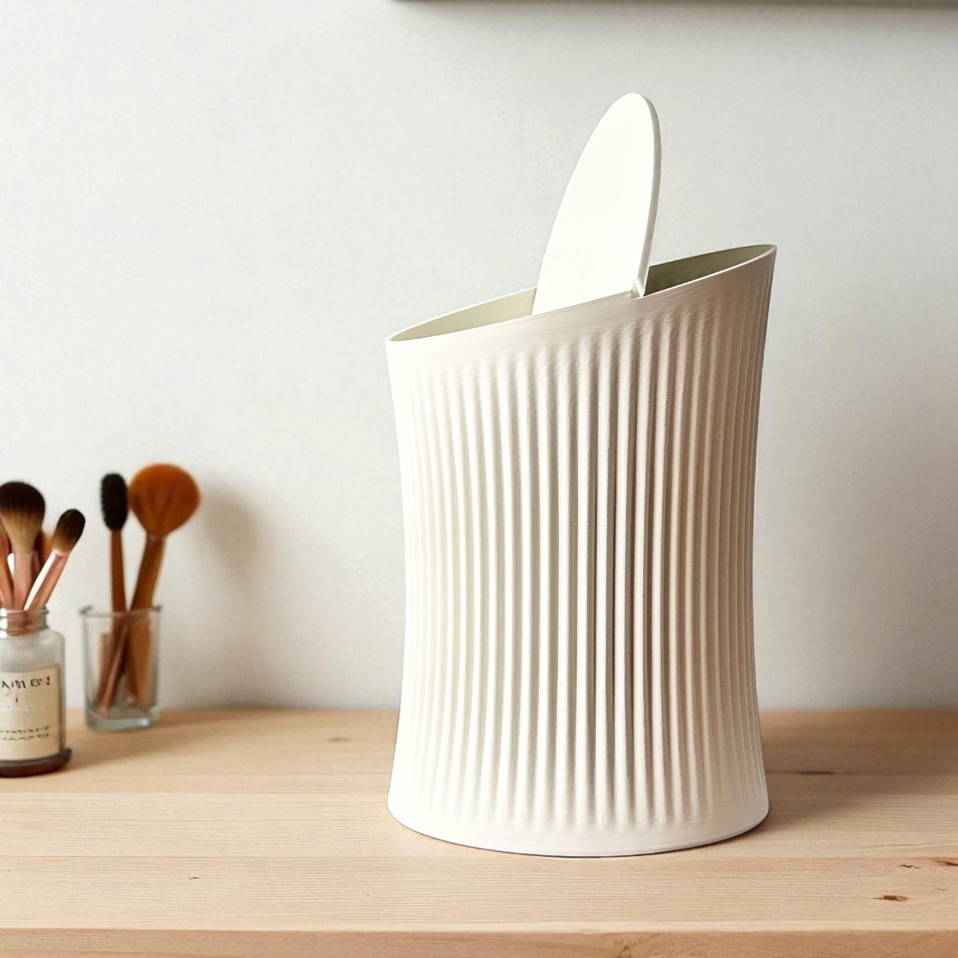 Small trash can for cotton pads, tissues, and desk clutter, minimalist design