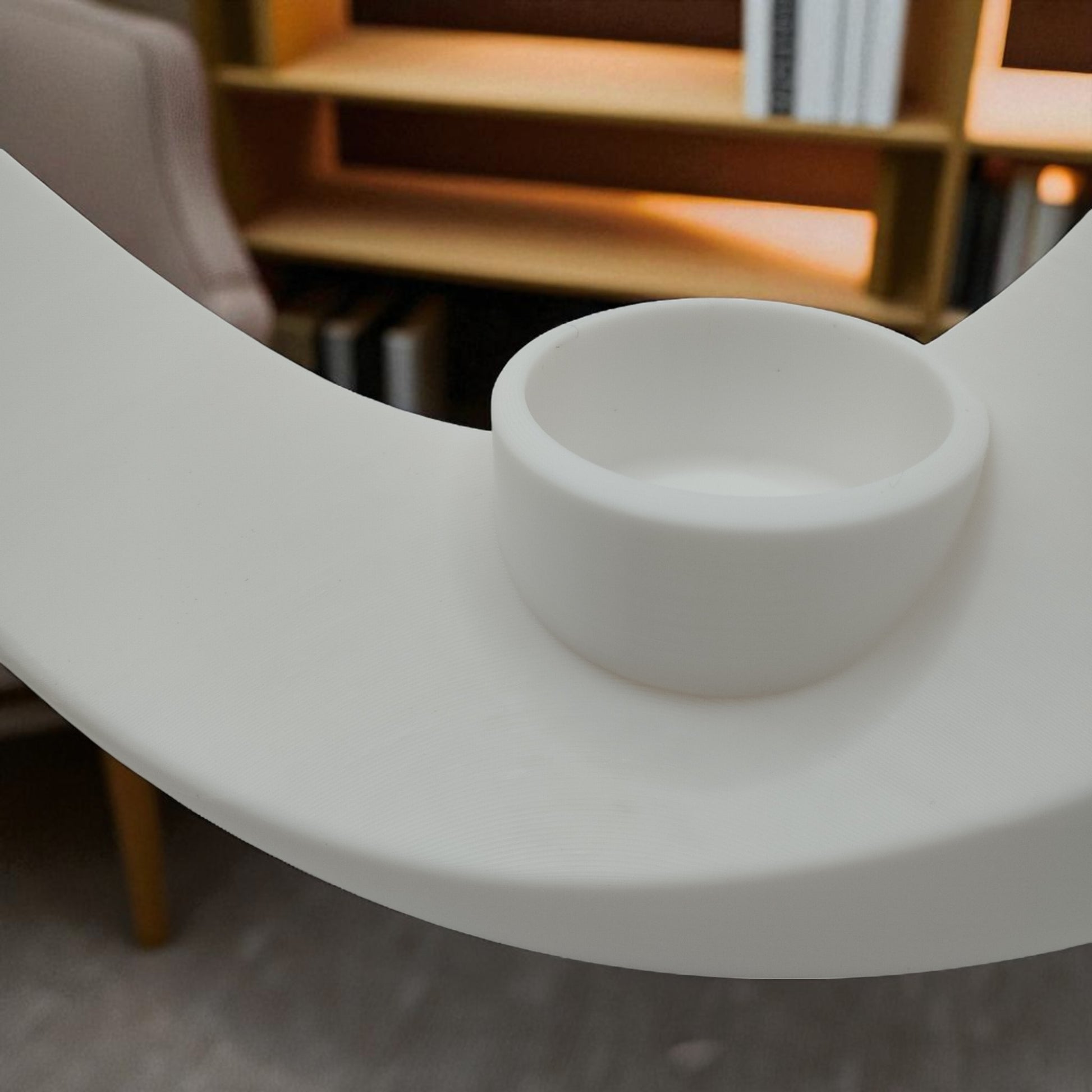 An elegant moon-inspired centerpiece with a celestial design, perfect for adding a touch of sophistication and romance to any space. This stunning decor piece captures the serene beauty of the moon, making it an ideal statement for tables, shelves, or special occasions.