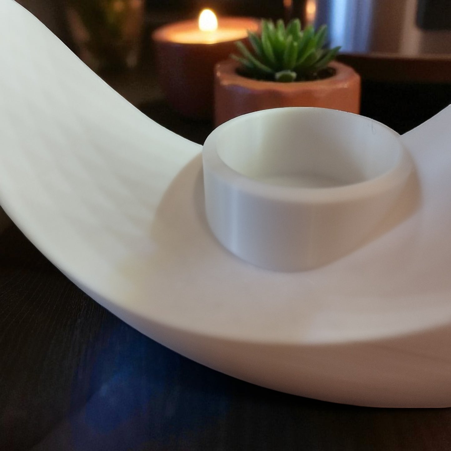 an elegant moon-inspired centerpiece with a celestial design, perfect for adding a touch of sophistication and romance to any space. this stunning decor piece captures the serene beauty of the moon, making it an ideal statement for tables, shelves, or special occasions.