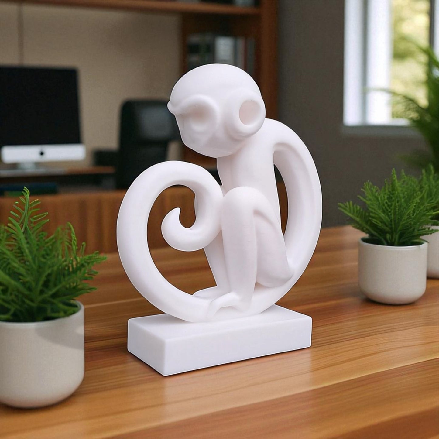 modern artistic monkey statue with a unique abstract design, 3d printed in eco-friendly material, ideal for home decor or as a gift for animal and art lovers.