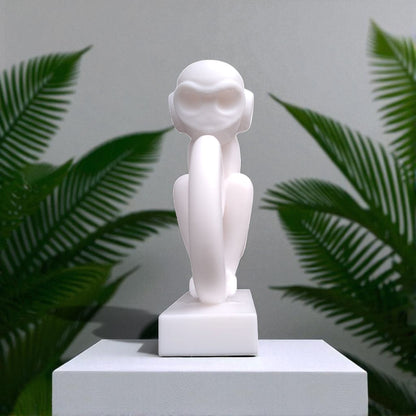 Modern artistic monkey statue with a unique abstract design, 3D printed in eco-friendly material, ideal for home decor or as a gift for animal and art lovers.
