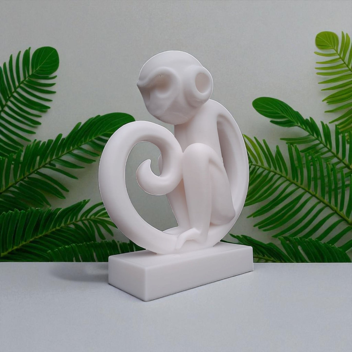 modern artistic monkey statue with a unique abstract design, 3d printed in eco-friendly material, ideal for home decor or as a gift for animal and art lovers.