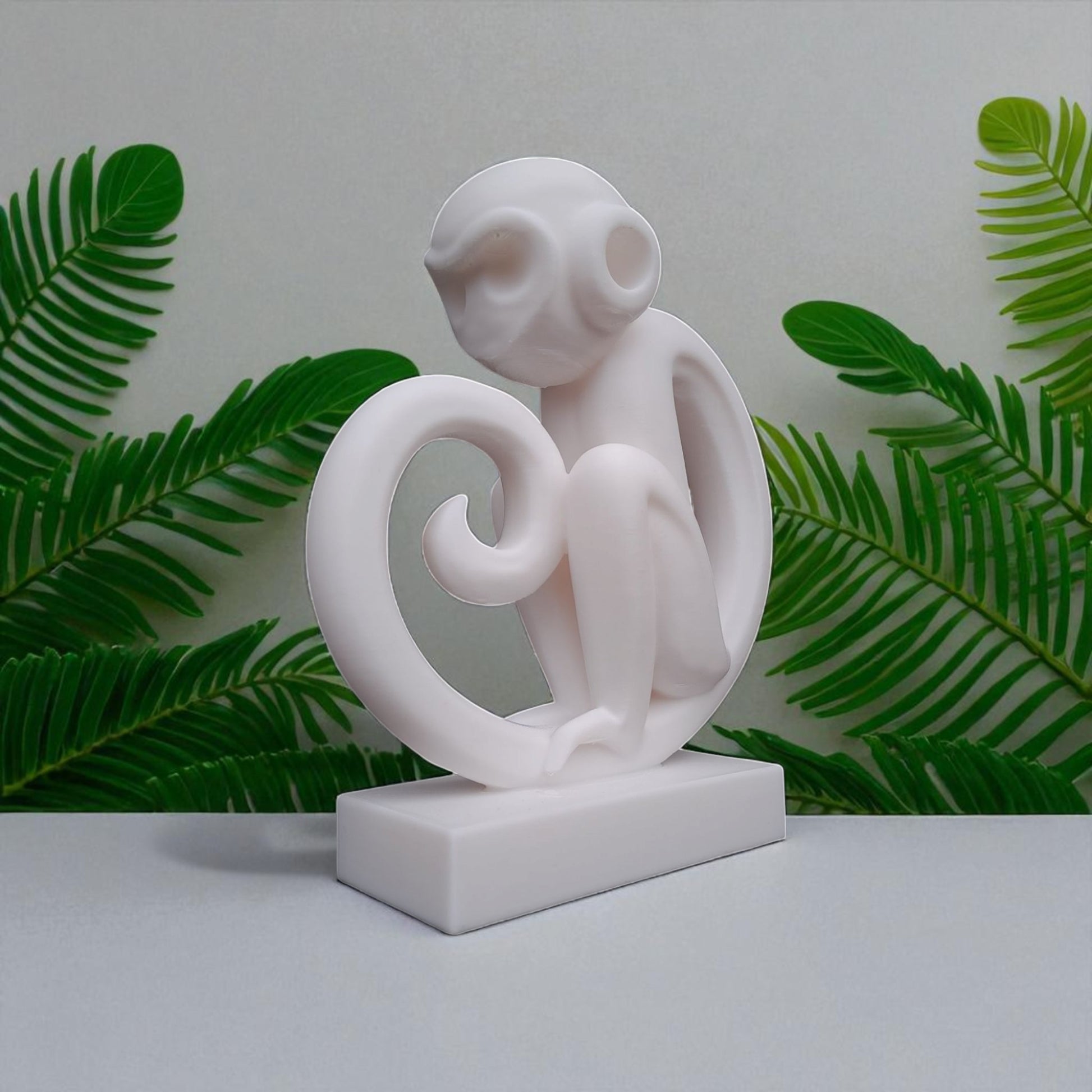Modern artistic monkey statue with a unique abstract design, 3D printed in eco-friendly material, ideal for home decor or as a gift for animal and art lovers.