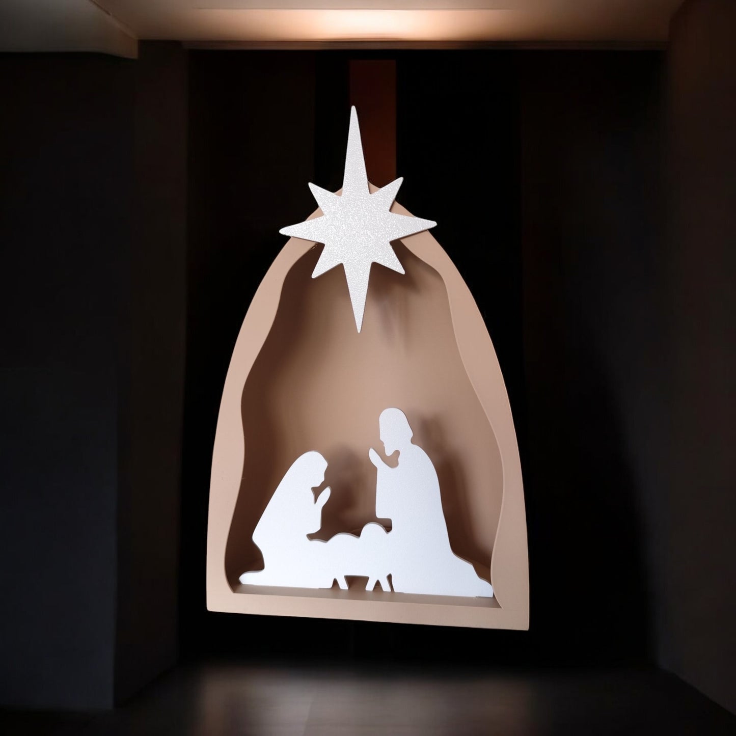 handmade nativity scene decoration displayed with a stable silhouette, holy family figures, star on top and optional led tealight, shown in a soft neutral colour. modern christmas home décor piece measuring 28.5 cm tall, 19 cm wide and 10 cm deep