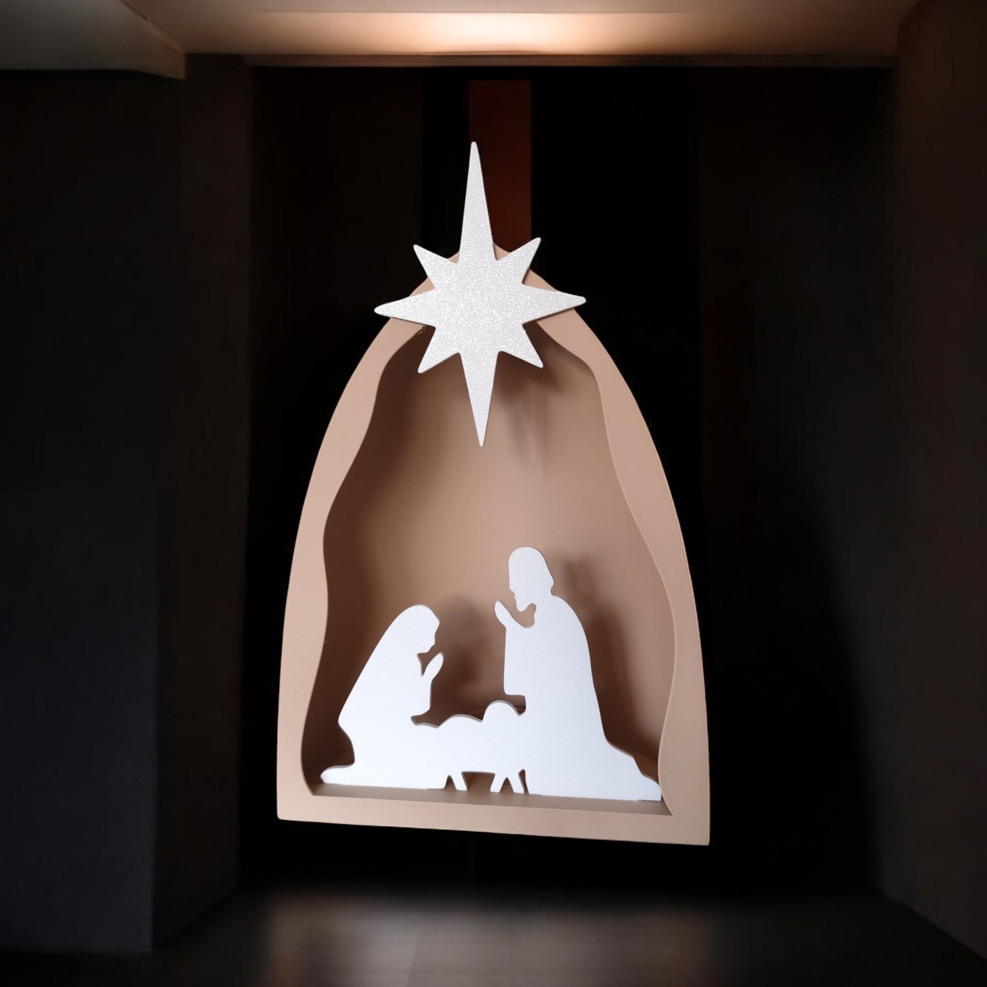 Handmade nativity scene decoration displayed with a stable silhouette, Holy Family figures, star on top and optional LED tealight, shown in a soft neutral colour. Modern Christmas home décor piece measuring 28.5 cm tall, 19 cm wide and 10 cm deep