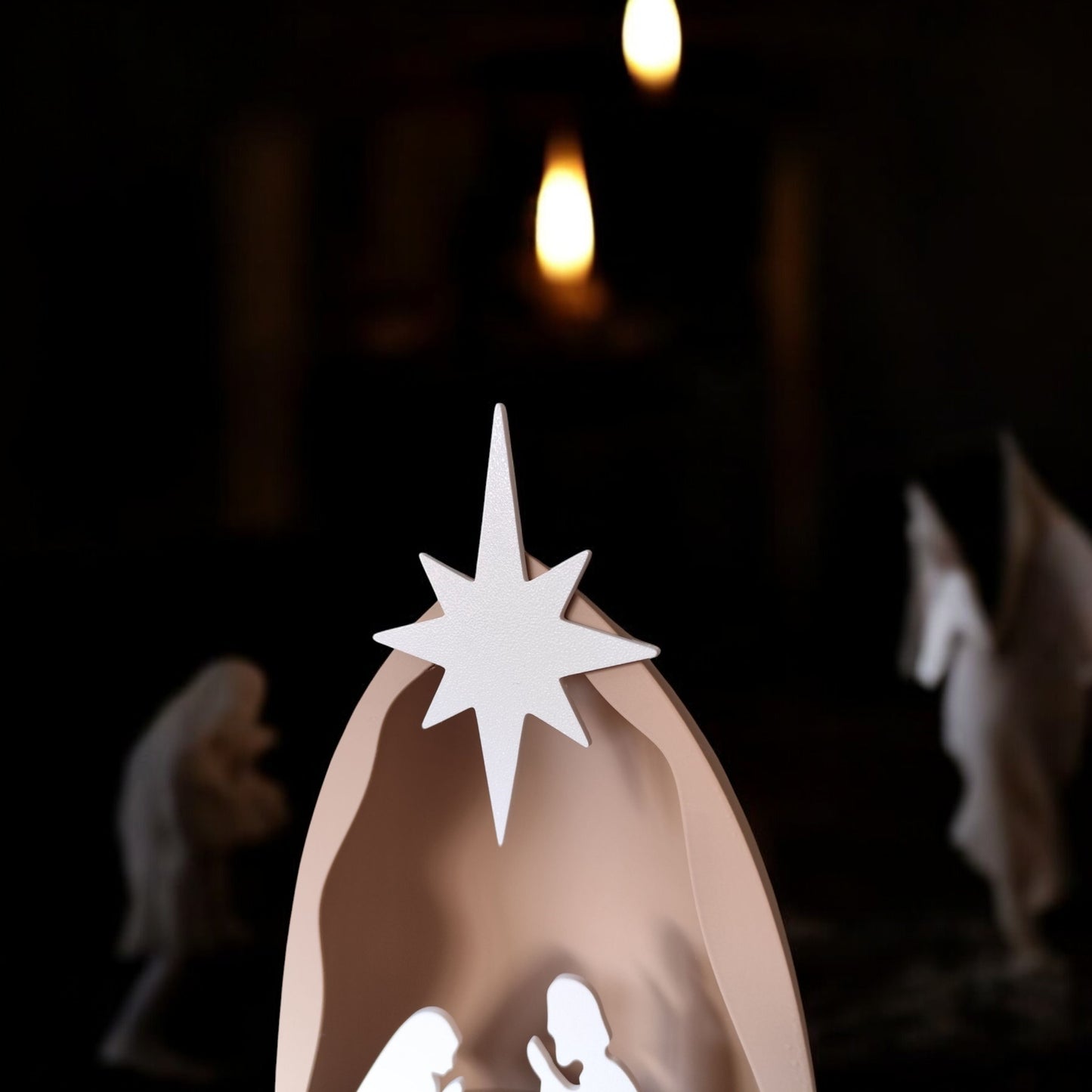 handmade nativity scene decoration displayed with a stable silhouette, holy family figures, star on top and optional led tealight, shown in a soft neutral colour. modern christmas home décor piece measuring 28.5 cm tall, 19 cm wide and 10 cm deep
