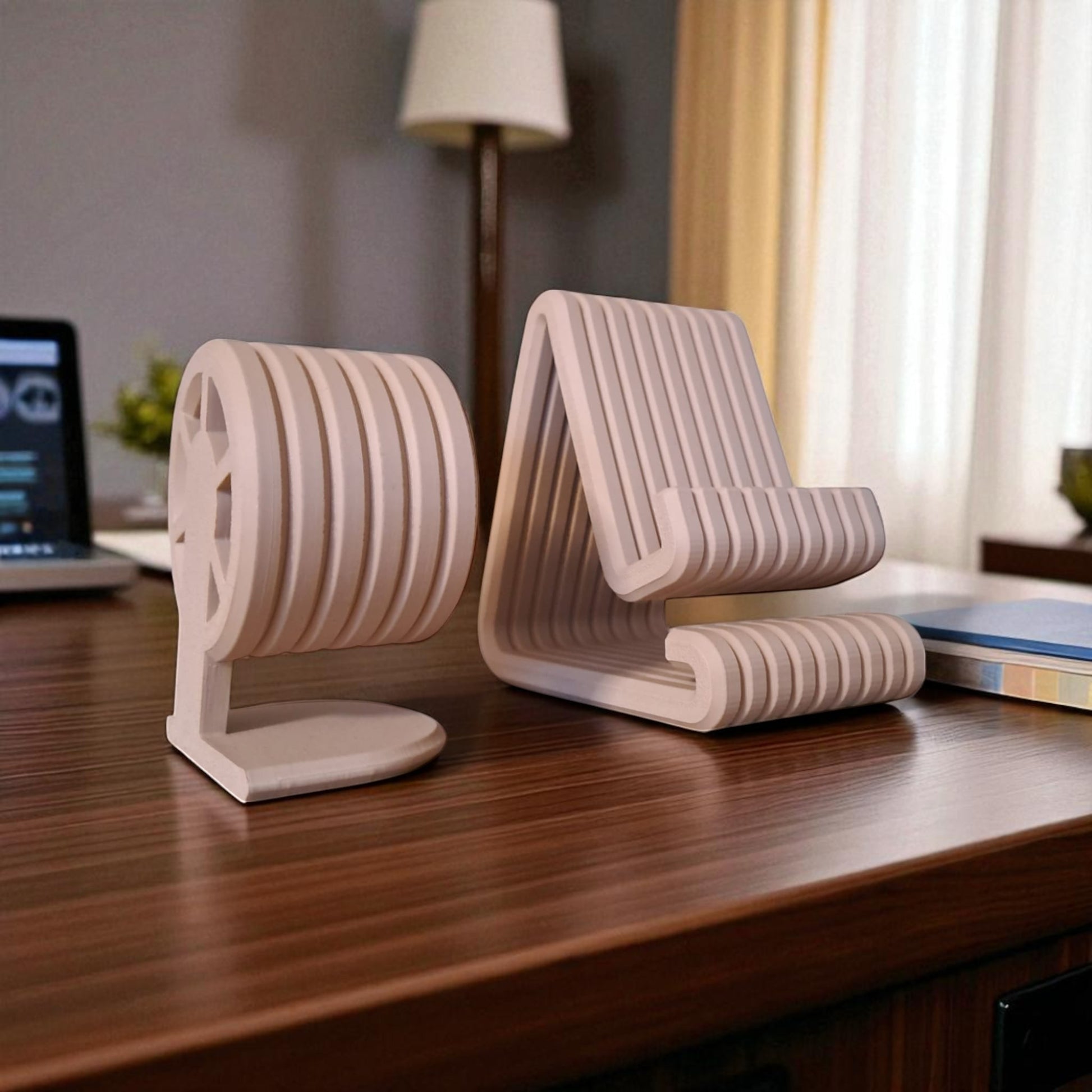Two beige desk organizers on a wooden surface with a laptop and books in the background.