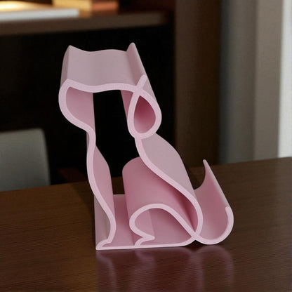 3D printed pink dog-shaped phone holder for desk, used to support a smartphone, tablet, or Kindle, ideal for pet lovers and home office decor