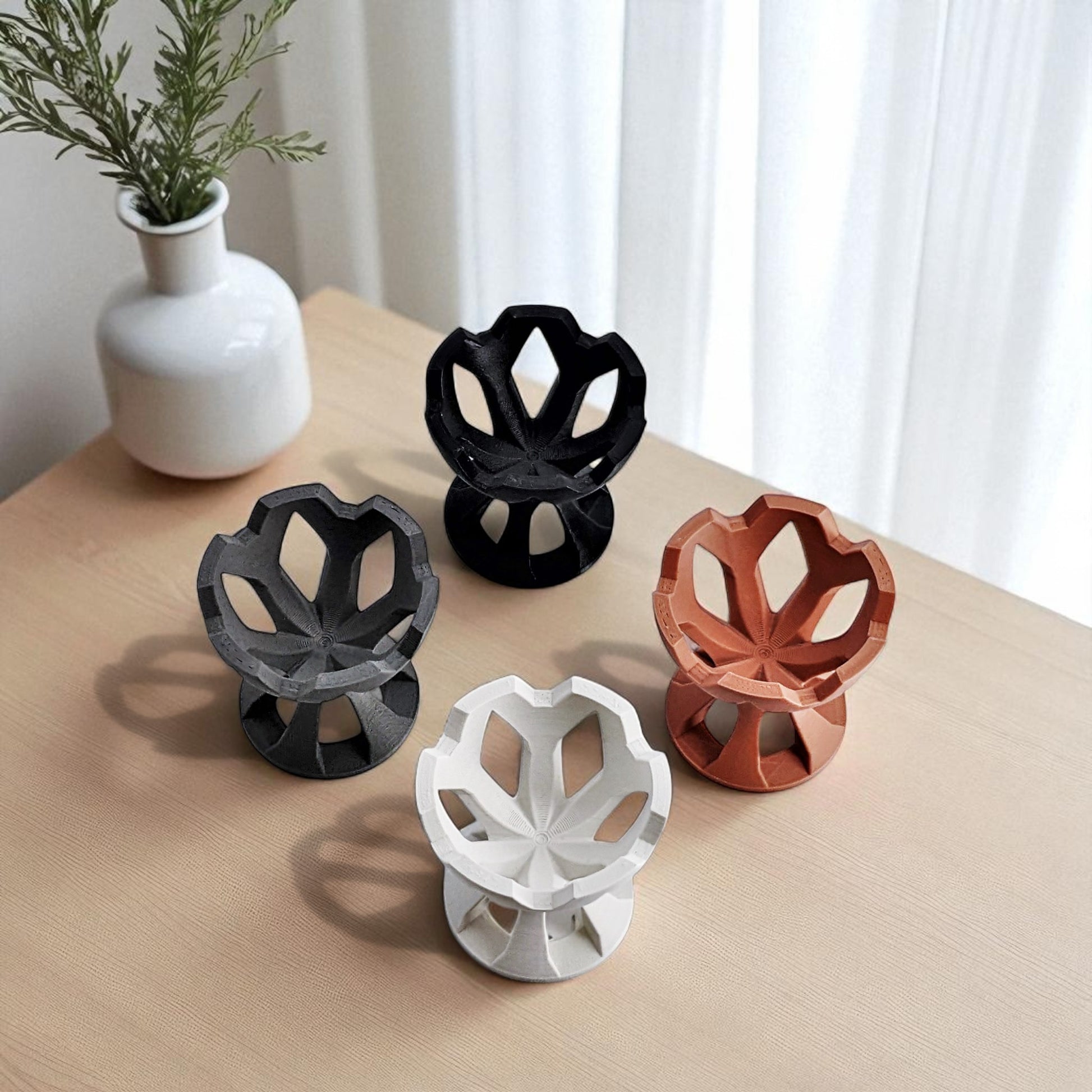 Elegant egg holder named 'EGG CROWN,' designed for a stylish presentation on the breakfast table. This unique egg stand adds a touch of sophistication to any meal, perfect for enjoying eggs in a refined and practical way