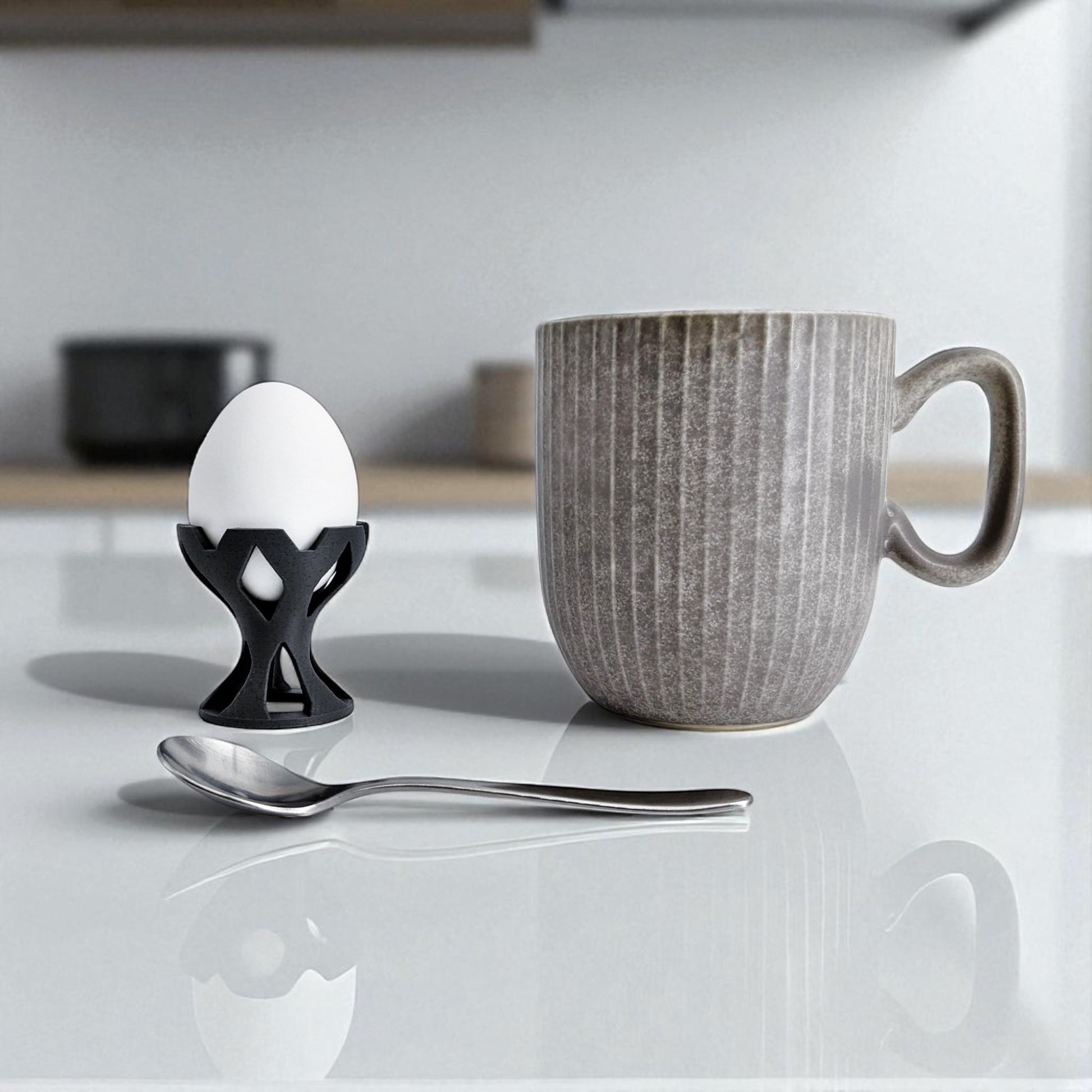 Elegant egg holder named 'EGG CROWN,' designed for a stylish presentation on the breakfast table. This unique egg stand adds a touch of sophistication to any meal, perfect for enjoying eggs in a refined and practical way