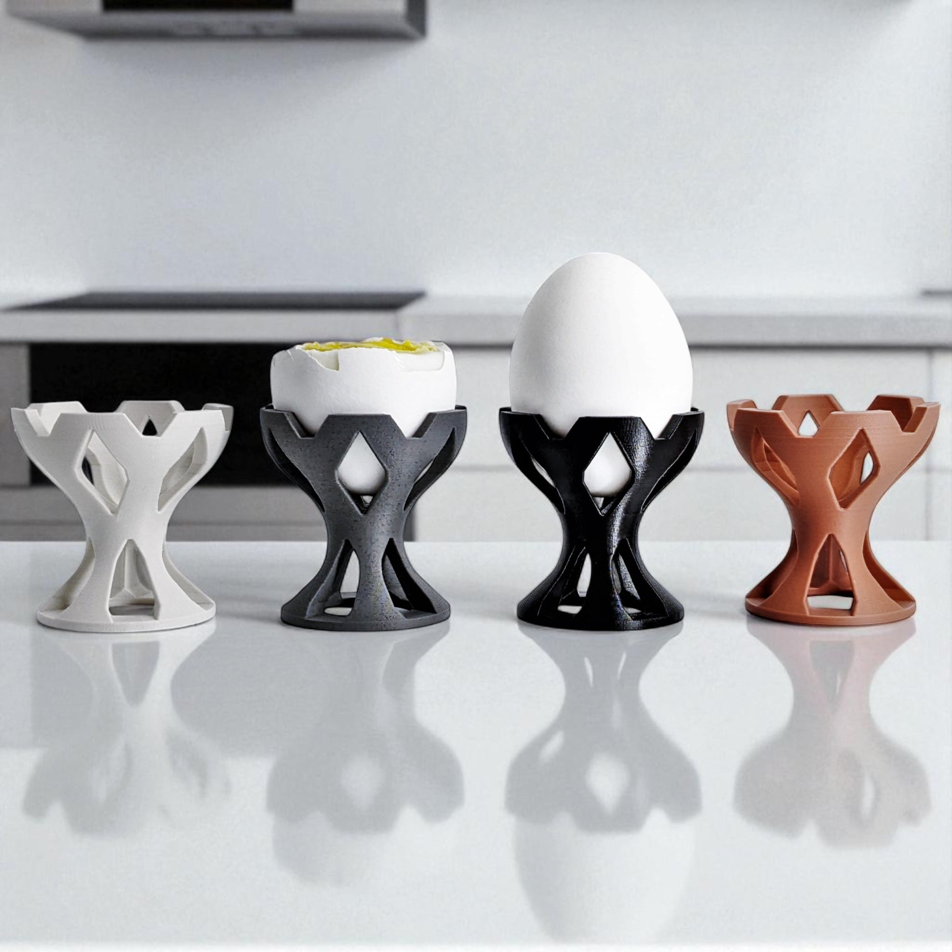 Elegant egg holder named 'EGG CROWN,' designed for a stylish presentation on the breakfast table. This unique egg stand adds a touch of sophistication to any meal, perfect for enjoying eggs in a refined and practical way