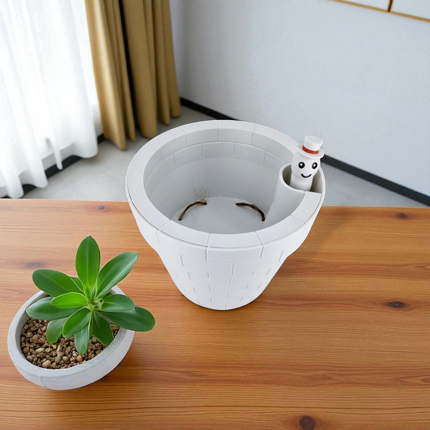 a clever and charming worm rise planter featuring a worm-shaped water indicator that rises to signal when the plant has enough water. perfect for plant lovers who value functionality and fun design
