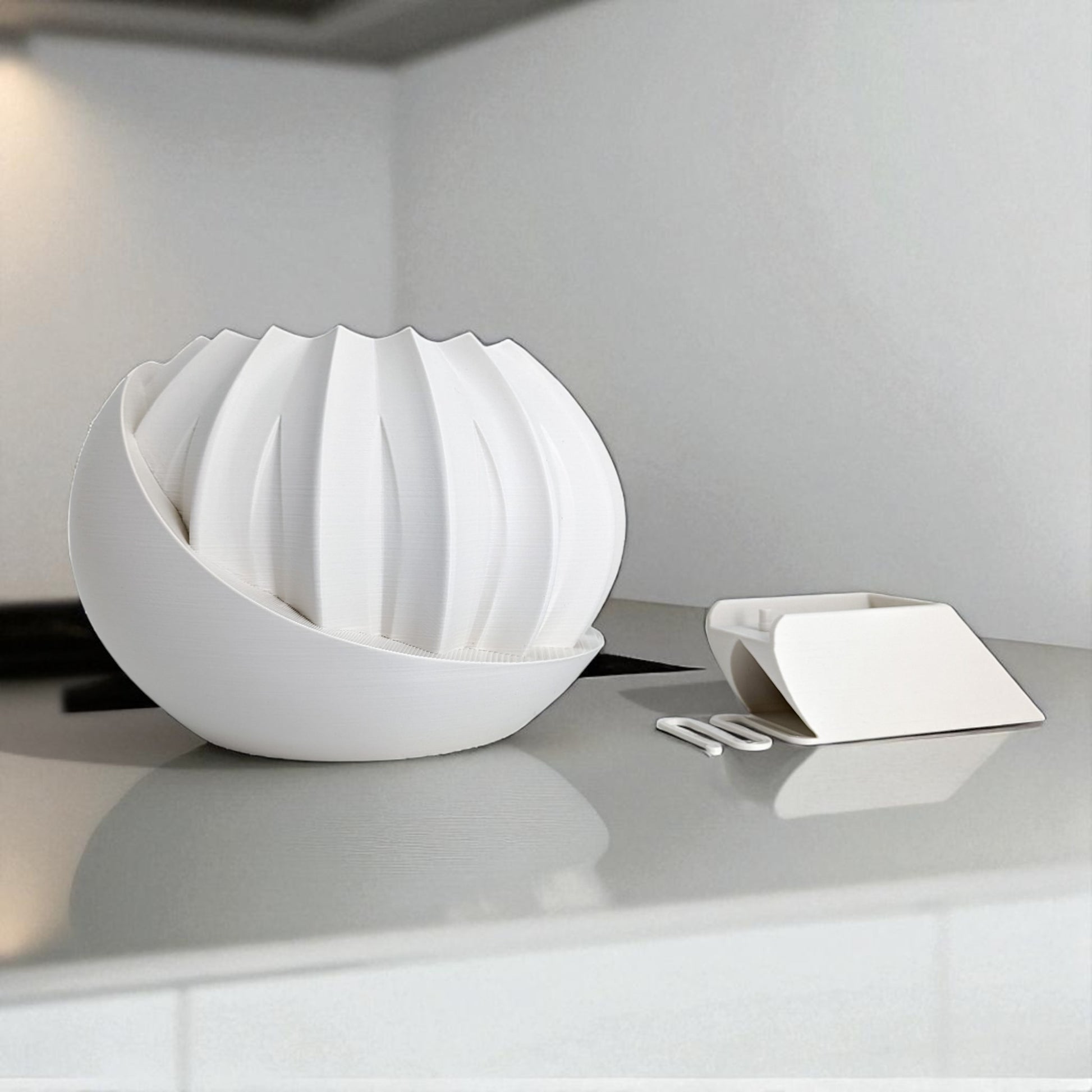 a modern 3D-printed plant pot with a hidden storage box, perfect for keeping small items discreetly tucked away. This unique design combines functionality with style, making it a standout piece for your home decor.