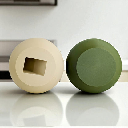a modern 3D-printed plant pot with a hidden storage box, perfect for keeping small items discreetly tucked away. This unique design combines functionality with style, making it a standout piece for your home decor.