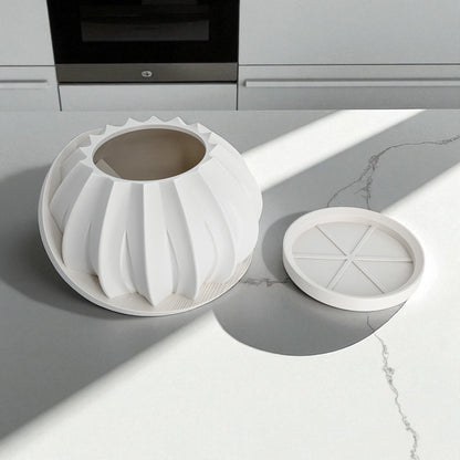 a modern 3D-printed plant pot with a hidden storage box, perfect for keeping small items discreetly tucked away. This unique design combines functionality with style, making it a standout piece for your home decor.