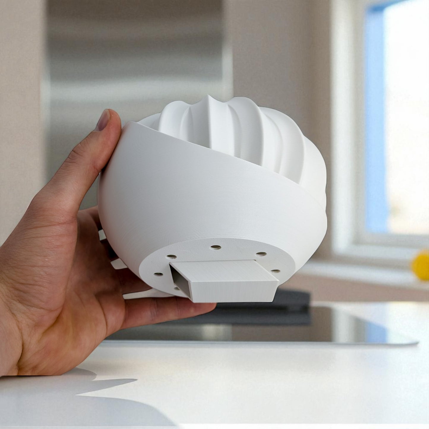 a modern 3d-printed plant pot with a hidden storage box, perfect for keeping small items discreetly tucked away. this unique design combines functionality with style, making it a standout piece for your home decor.