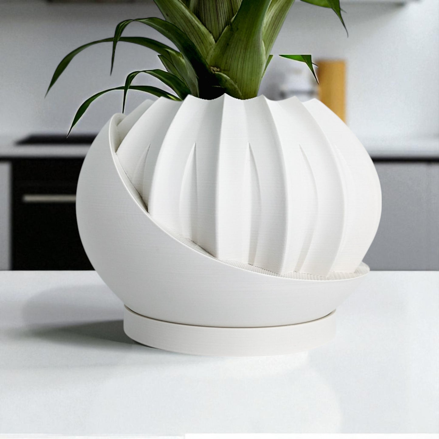 a modern 3d-printed plant pot with a hidden storage box, perfect for keeping small items discreetly tucked away. this unique design combines functionality with style, making it a standout piece for your home decor.