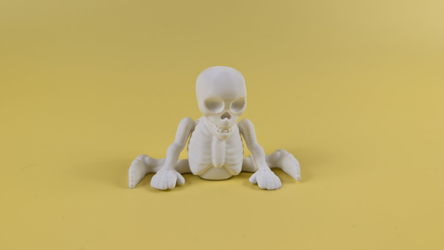 white 3d-printed skeleton figurine raising both arms on a yellow background; spooky-cute desk buddy with lightly poseable joints.