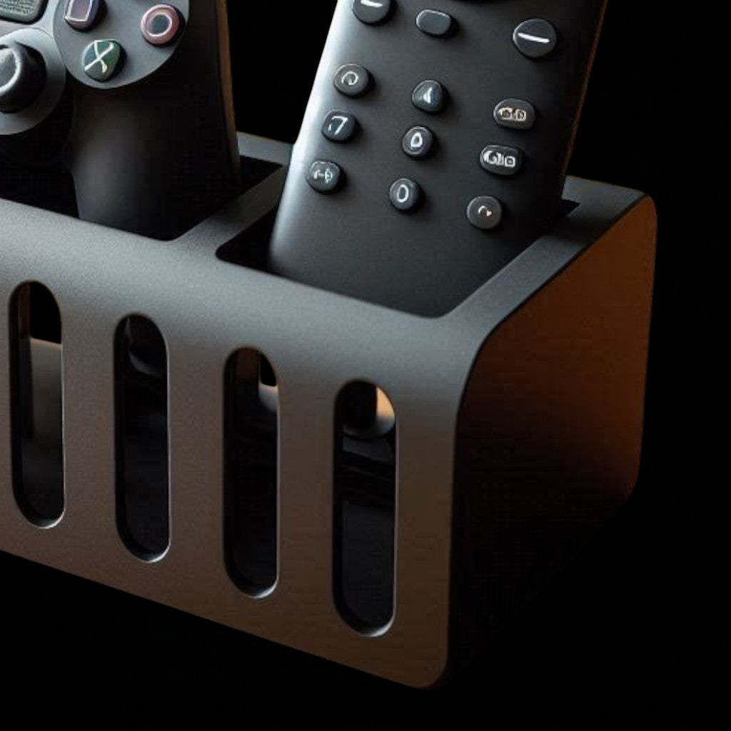 A modern and stylish gaming controller and remote holder, designed to store one controller and at least two remotes. Features a sleek, space-saving design, perfect for organizing entertainment centers, desks, or gaming setups. Made with high-quality 3D-printed materials for durability and a clean, modern look.