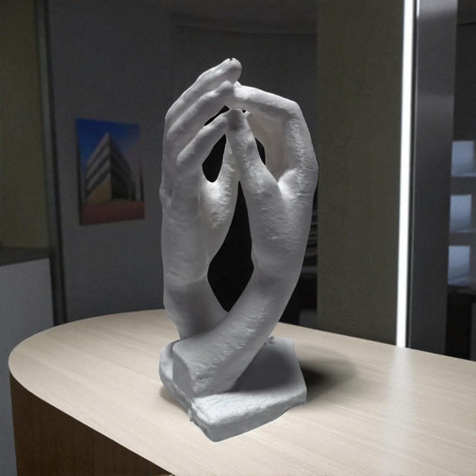  two elegantly crafted hands reaching out and touching, symbolizing connection, unity, and timeless bond. The design features  flowing curves that its artistic and modern aesthetic, making it a perfect decorative piece for any space.