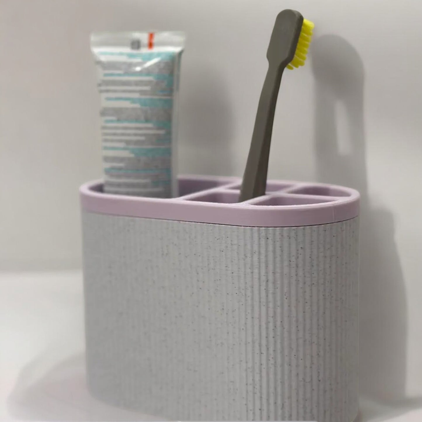 toothbrush wallcaddy  stylish wall-mounted toothbrush holder for organized bathrooms