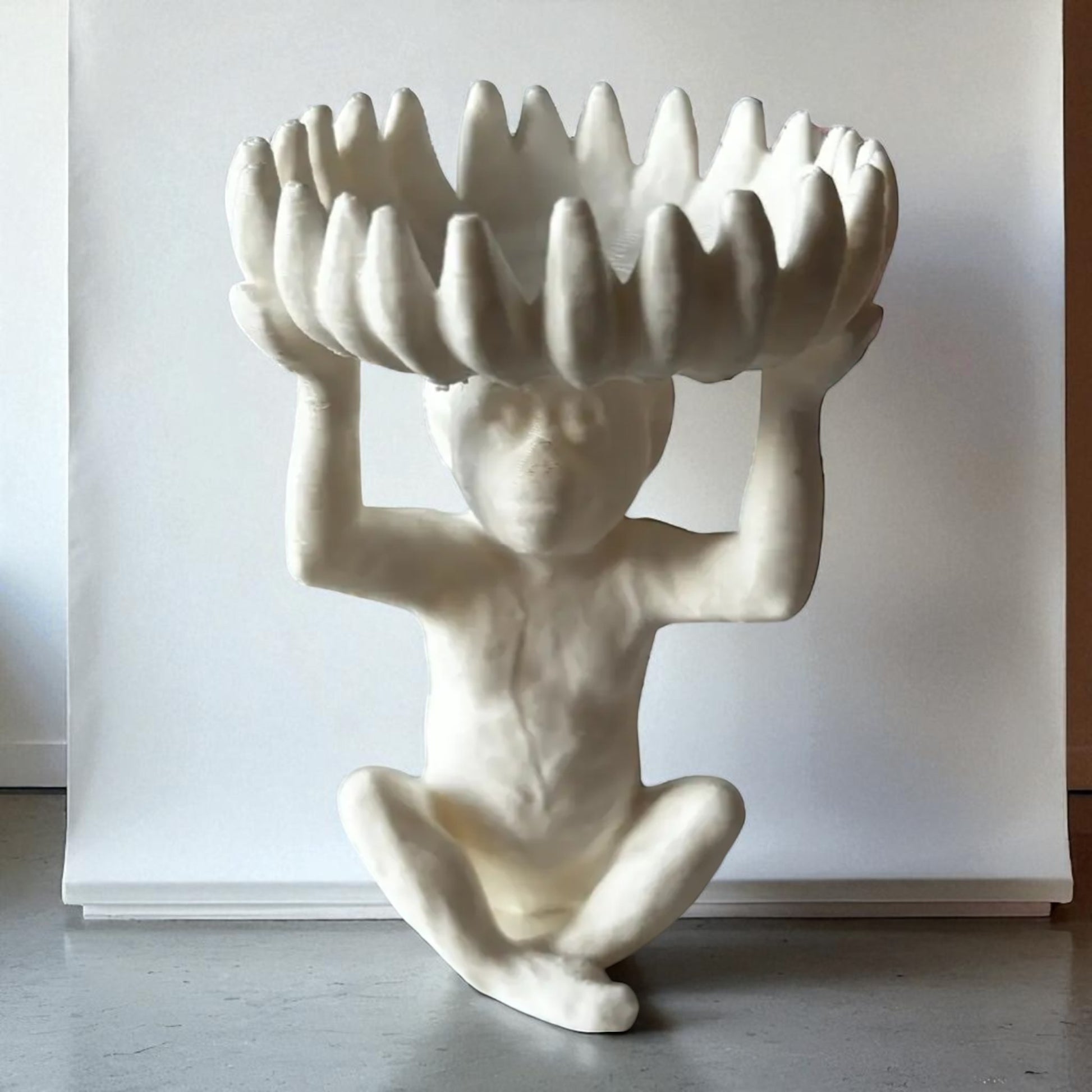 A charming monkey statue designed with a playful and detailed aesthetic, featuring a bowl atop its head shaped like a banana, perfect for holding fruit, candies, or small items, adding a whimsical touch to your home decor