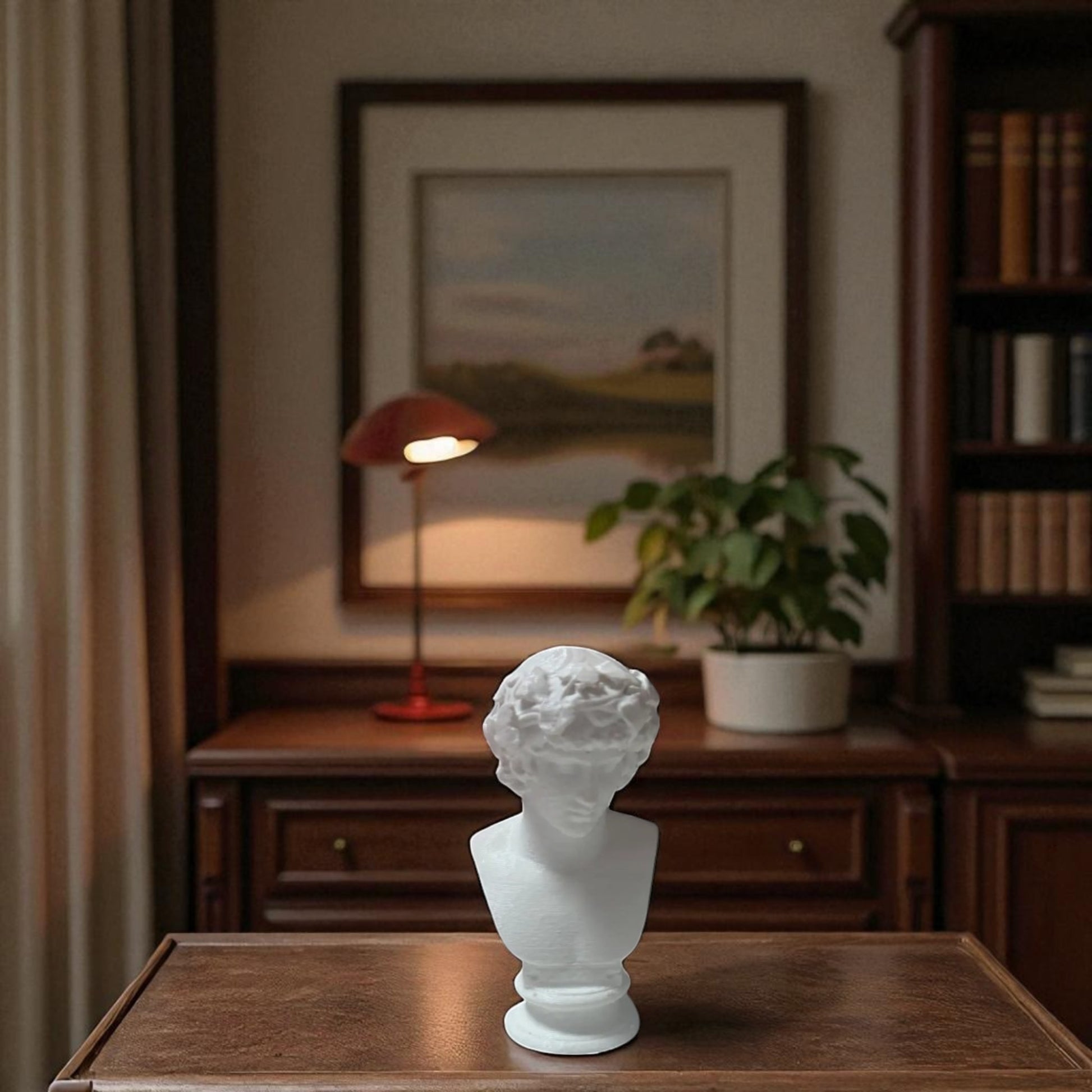 A detailed bust of Michelangelo’s David, capturing the timeless elegance and strength of this classical masterpiece. This sculpture adds an artistic and sophisticated touch to any decor, embodying the iconic beauty of Renaissance art