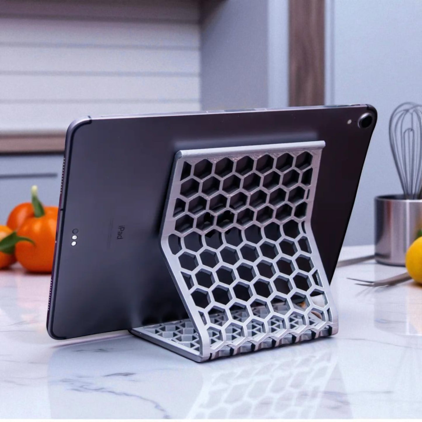 honeycomb stand: a versatile and stylish stand with a honeycomb pattern, designed to hold phones, tablets, and kindles securely at an optimal viewing angle, blending functionality with modern design.