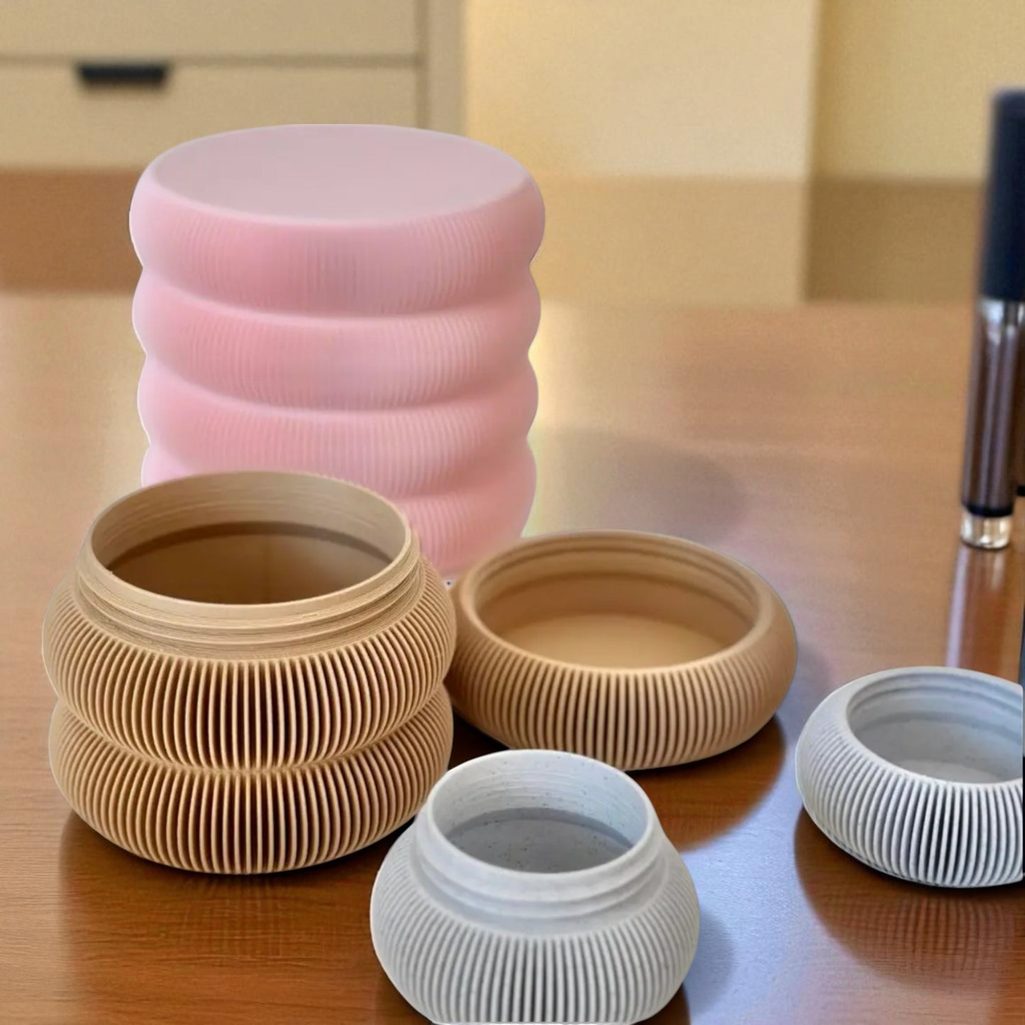 set of elegant vanity jars in three different sizes, perfect for organizing cosmetics or accessories; available for purchase individually or as a complete set to enhance any bathroom or dressing table decor.